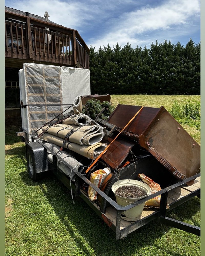 Furniture and debris loaded for removal
